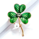 Gold shamrock pin/brooch with green enamel , simulated pearl and rhinestone