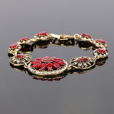 Antique gold plated Turkish Style bracelet 8 in with red resin stones