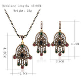 Turkish Style Hand of Fatima necklace and earrings set with red colored  stones