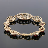 Antique gold plated Turkish Style bracelet 8 in with red resin stones