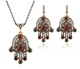 Turkish Style Hand of Fatima necklace and earrings set with red colored  stones