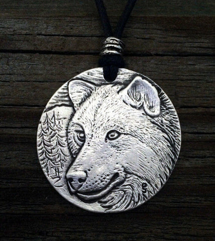 Wildlife Wolf pendant with adjustable black cotton cord made in USA