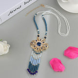 India Style gold color necklace with blue and clear stones and beaded tassels