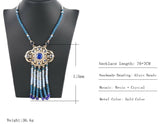 India Style gold color necklace with blue and clear stones and beaded tassels