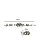 Antique gold plated Turkish Style bracelet 7.5 in with green resin stones