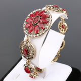 Antique gold plated Turkish Style bracelet 8 in with red resin stones