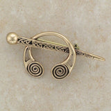 Irish  Bronze celtic brooch with a pin and torc design.